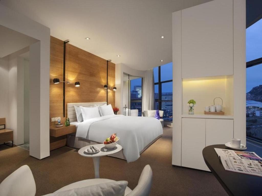 หิมาลายาส ชิงเต่า โฮเต็ล Hotel ภายนอก รูปภาพ