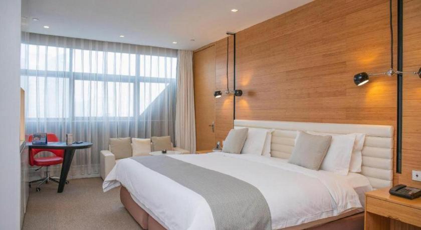 หิมาลายาส ชิงเต่า โฮเต็ล Hotel ภายนอก รูปภาพ